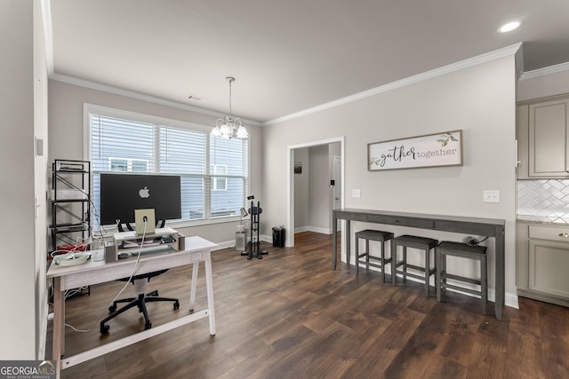 office area featuring an inviting chandelier, ornamental molding, and dark hardwood / wood-style flooring