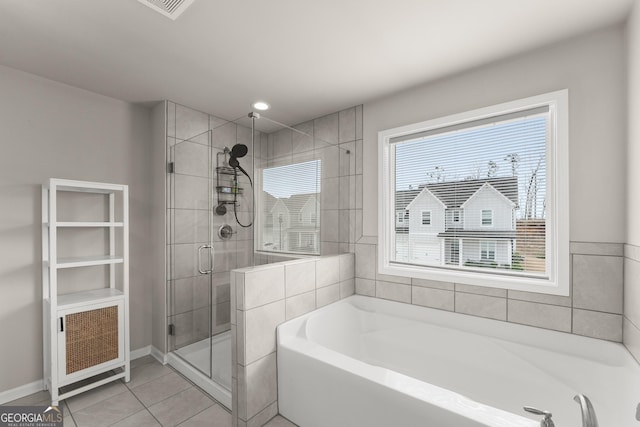 bathroom with plus walk in shower and tile patterned floors