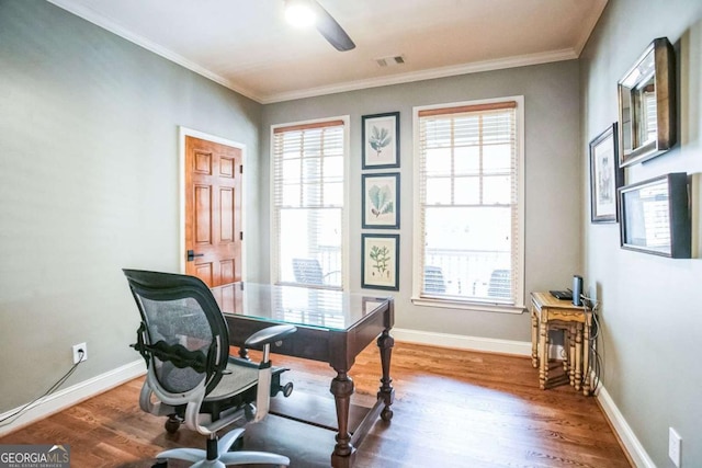 home office featuring crown molding and wood-type flooring