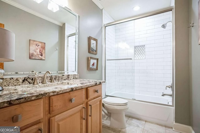 full bathroom featuring shower / bath combination with glass door, tile patterned flooring, ornamental molding, vanity, and toilet