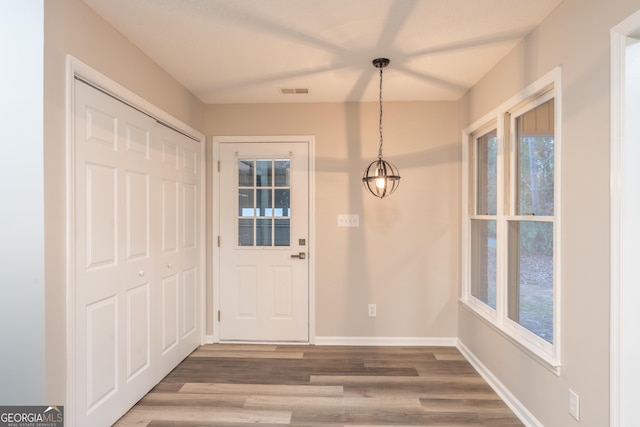 doorway to outside featuring hardwood / wood-style floors