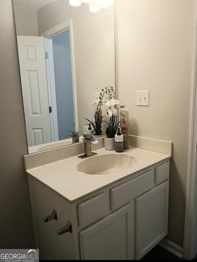 bathroom featuring vanity