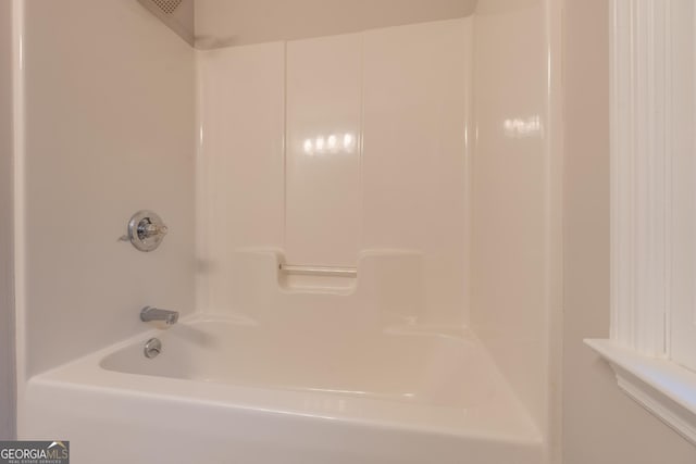 bathroom featuring bathing tub / shower combination