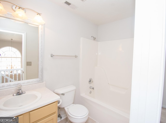 full bathroom featuring vanity, toilet, and washtub / shower combination