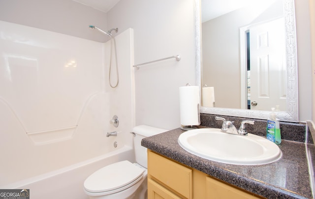 full bathroom featuring vanity, toilet, and shower / washtub combination