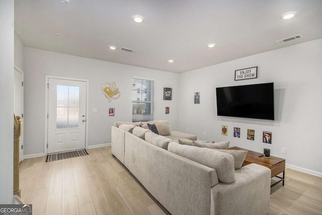 living room with light wood-type flooring