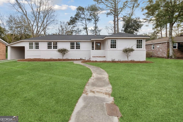 single story home with a carport and a front yard