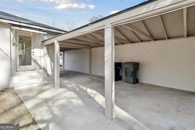 view of patio / terrace with a carport