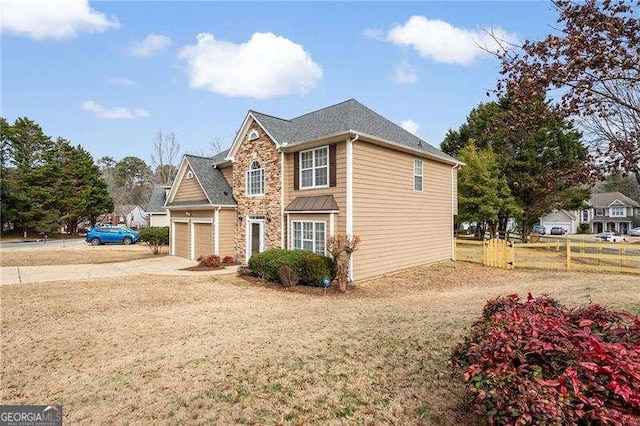 view of front of home with a garage