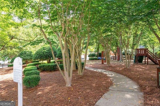 surrounding community featuring a playground