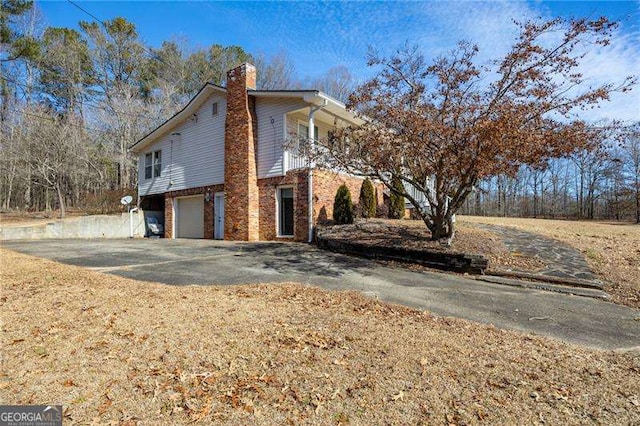 view of home's exterior featuring a garage