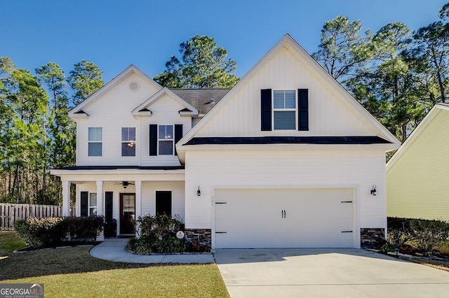 view of front of home with a garage and a front yard