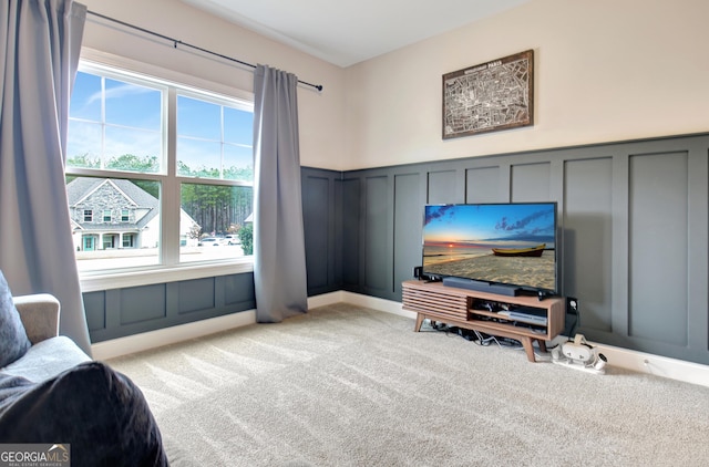 living room featuring light carpet