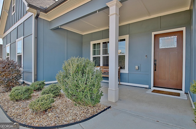 doorway to property featuring a porch