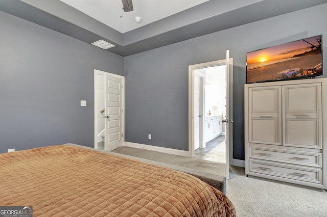 carpeted bedroom with ceiling fan