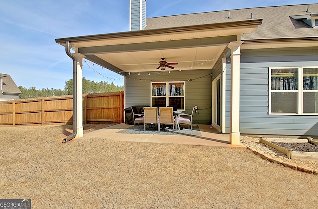 exterior space featuring ceiling fan