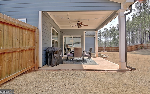 view of patio featuring grilling area and ceiling fan