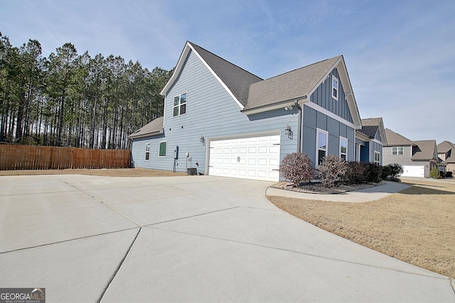 view of side of property featuring a garage