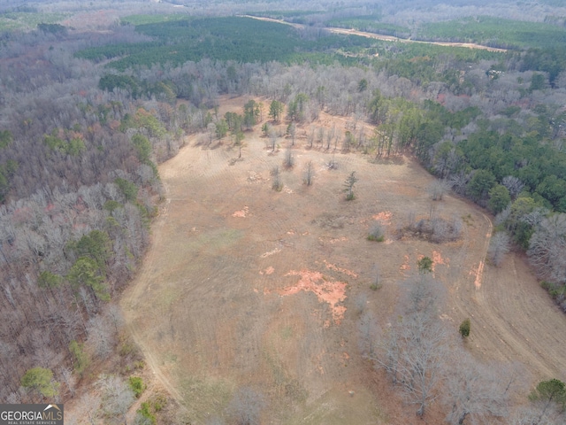 drone / aerial view with a forest view