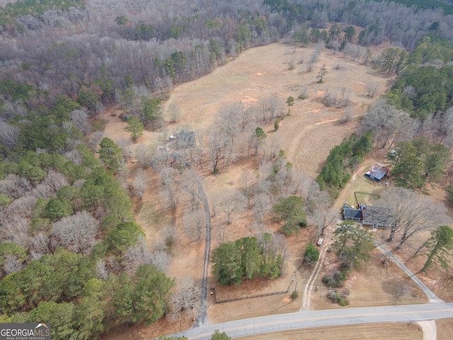 aerial view featuring a forest view