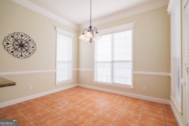 unfurnished dining area with light tile patterned floors, crown molding, a chandelier, and a healthy amount of sunlight