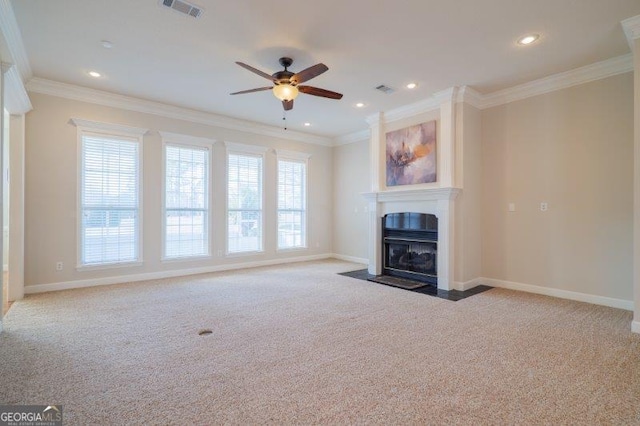 unfurnished living room featuring light carpet, crown molding, and ceiling fan