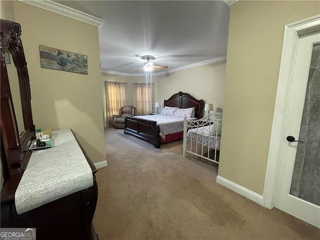 carpeted bedroom with crown molding and ceiling fan