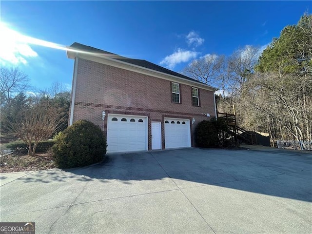 view of home's exterior featuring a garage