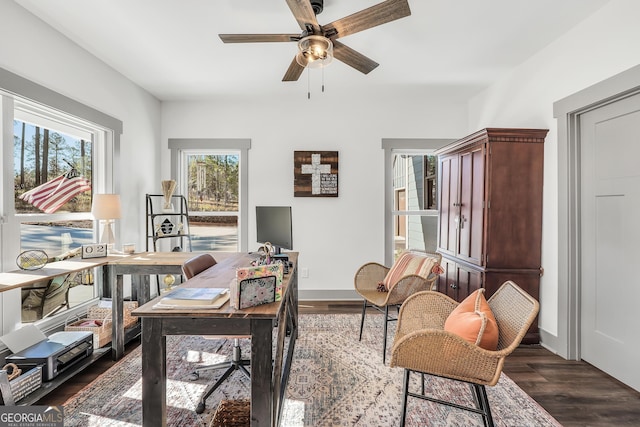 office area with dark hardwood / wood-style floors and ceiling fan