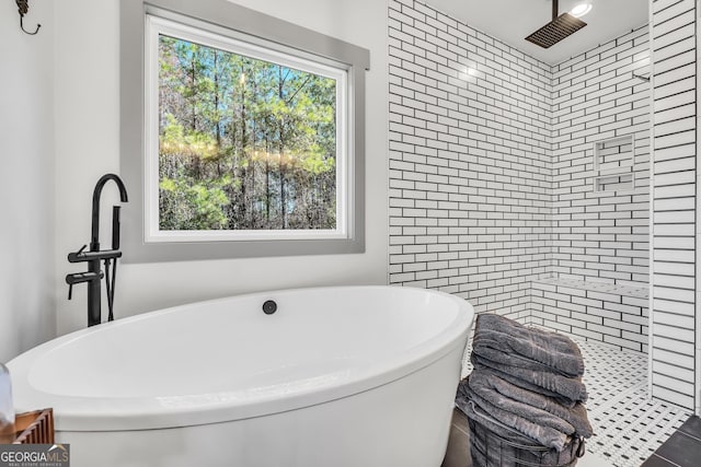 bathroom with independent shower and bath