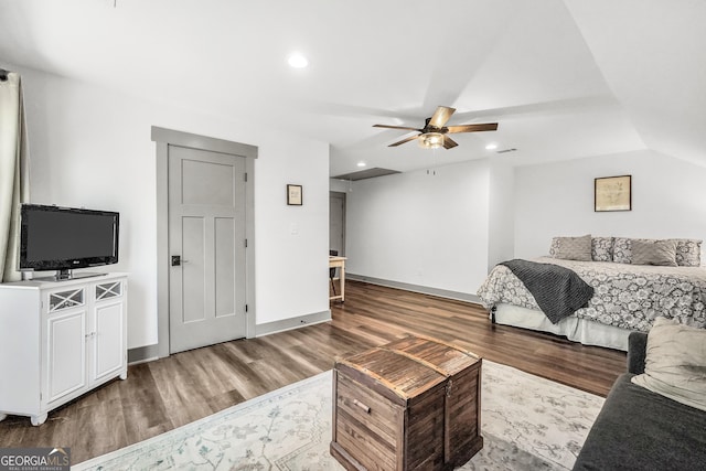 bedroom with hardwood / wood-style flooring and ceiling fan