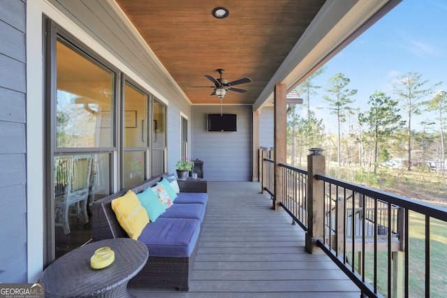 wooden terrace with ceiling fan