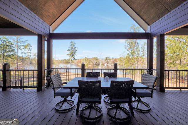 wooden deck featuring a water view