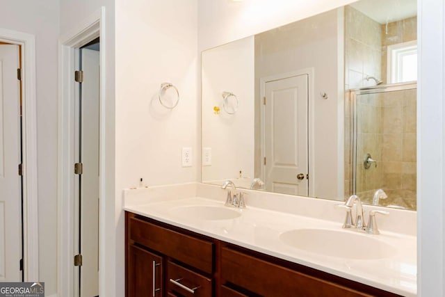 bathroom featuring vanity and walk in shower