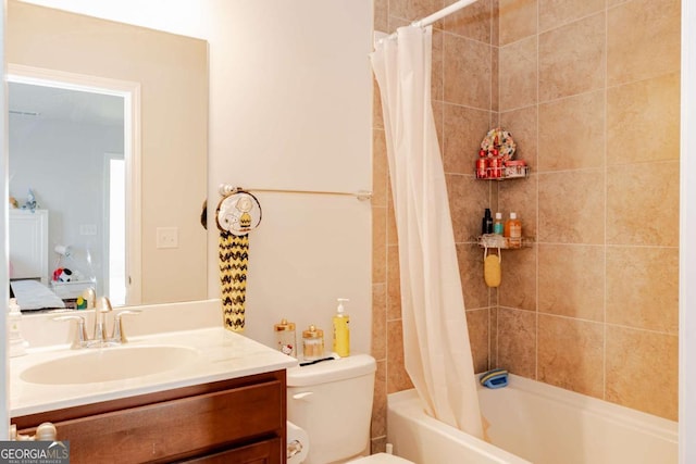 full bathroom featuring vanity, shower / bath combo, and toilet