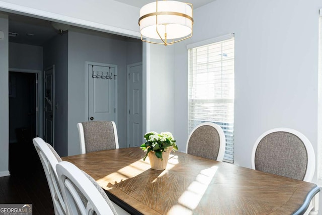 dining space featuring hardwood / wood-style flooring