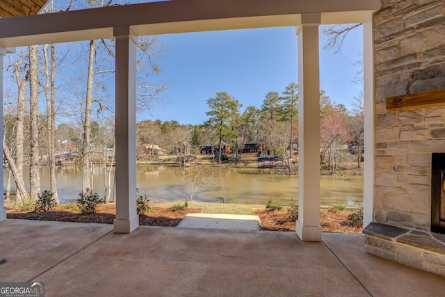 view of patio / terrace with a water view