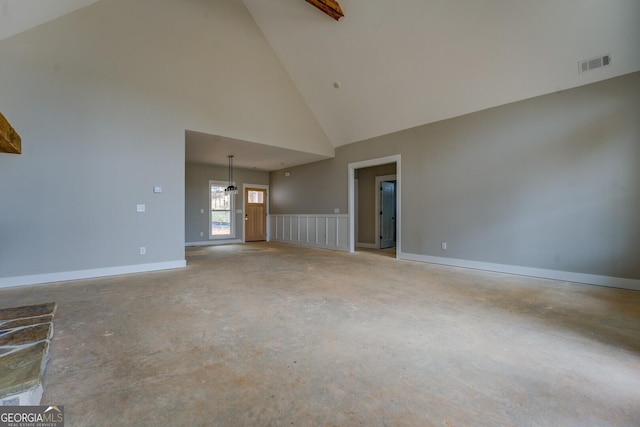 unfurnished living room featuring visible vents, baseboards, high vaulted ceiling, and concrete flooring