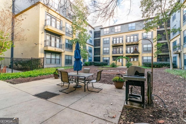 view of patio featuring a grill