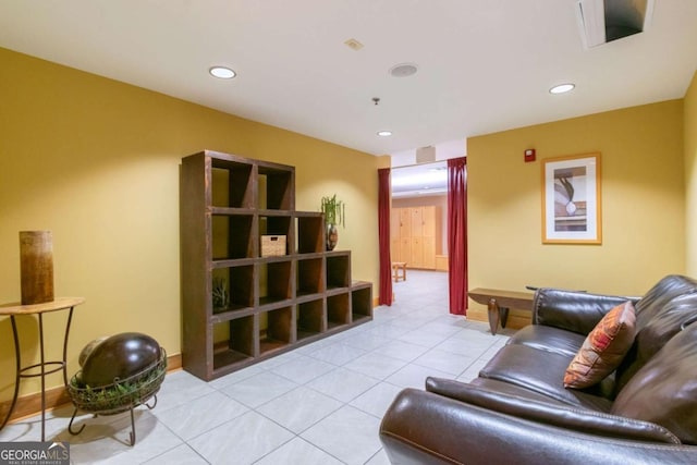 living room with light tile patterned floors