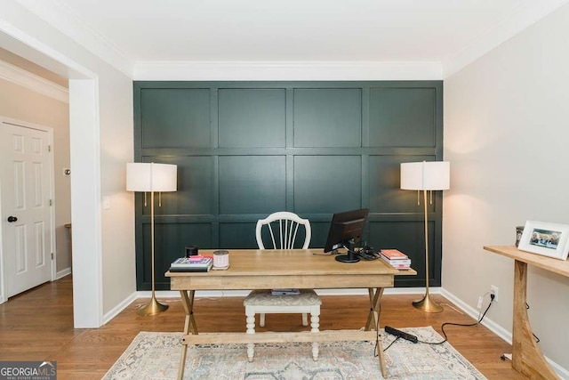 office featuring crown molding and hardwood / wood-style floors