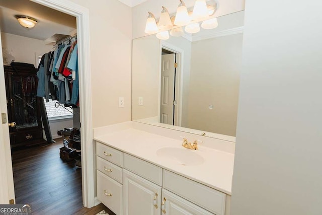 bathroom with vanity and hardwood / wood-style floors