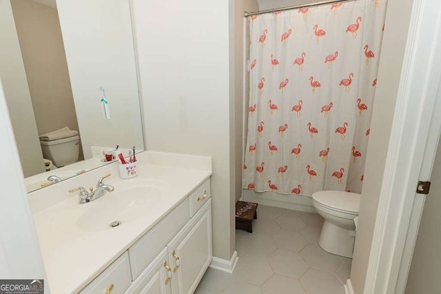 full bathroom with tile patterned floors, vanity, toilet, and shower / tub combo