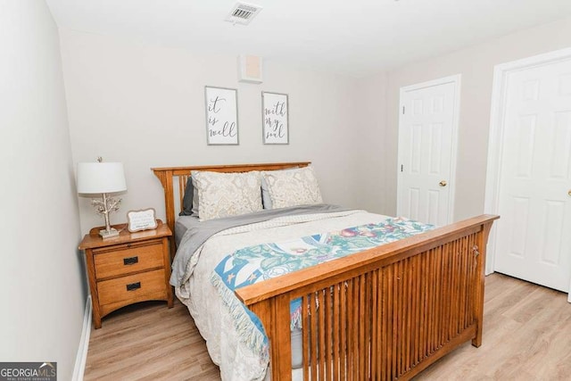 bedroom featuring light hardwood / wood-style floors