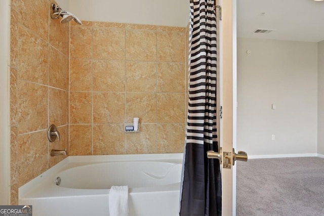 bathroom featuring shower / bathtub combination with curtain