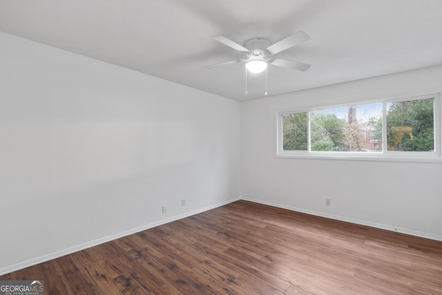 unfurnished room featuring hardwood / wood-style floors and ceiling fan