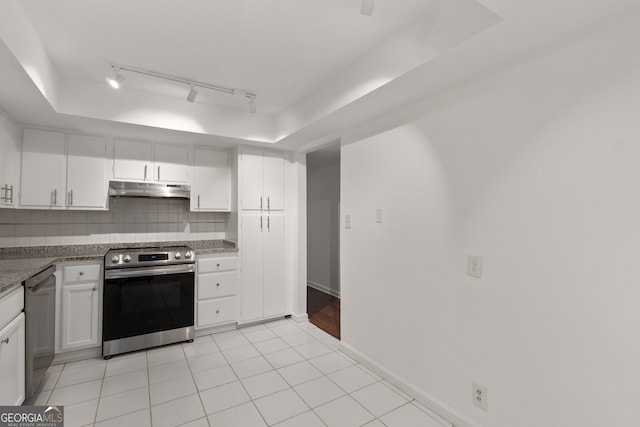 kitchen featuring electric range, black dishwasher, white cabinets, decorative backsplash, and a raised ceiling