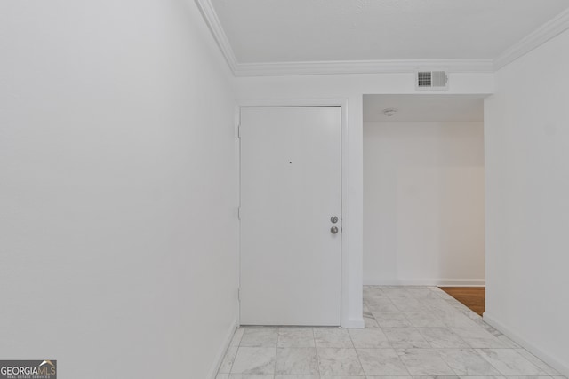 interior space with crown molding