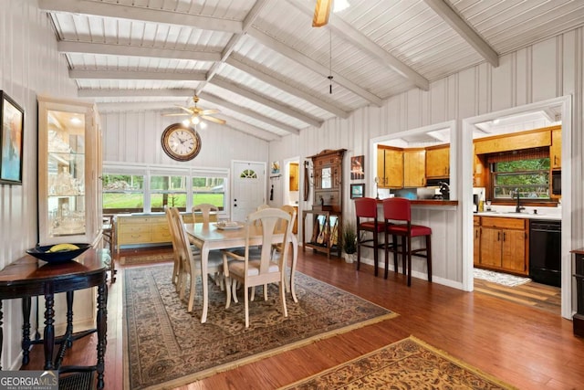 dining space with lofted ceiling, sink, dark hardwood / wood-style floors, and ceiling fan