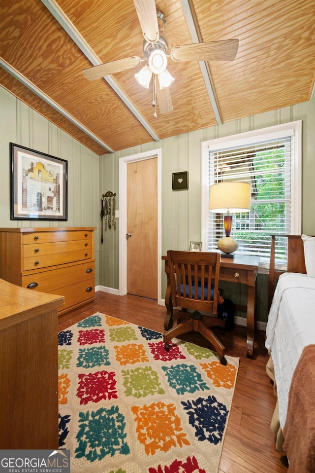 bedroom with lofted ceiling, wood ceiling, and hardwood / wood-style flooring